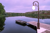 Enjoy a cup of coffee at the pond at Three Falls Cove